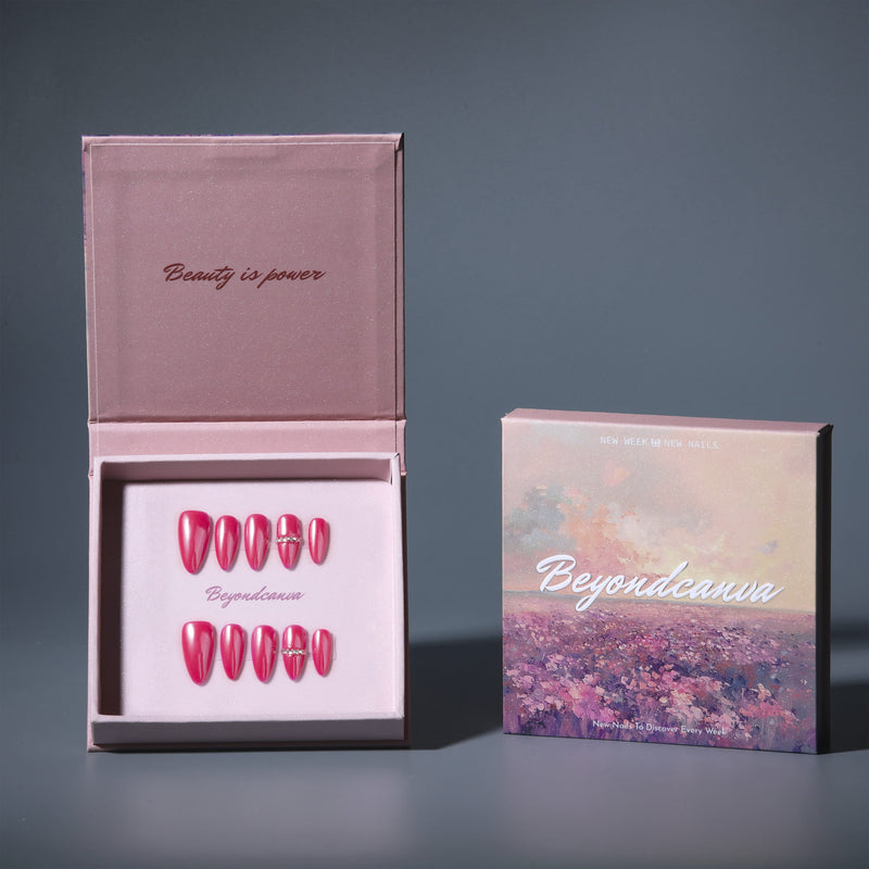 Open packaging box showing hot pink press-on nails with a separate branded card.
