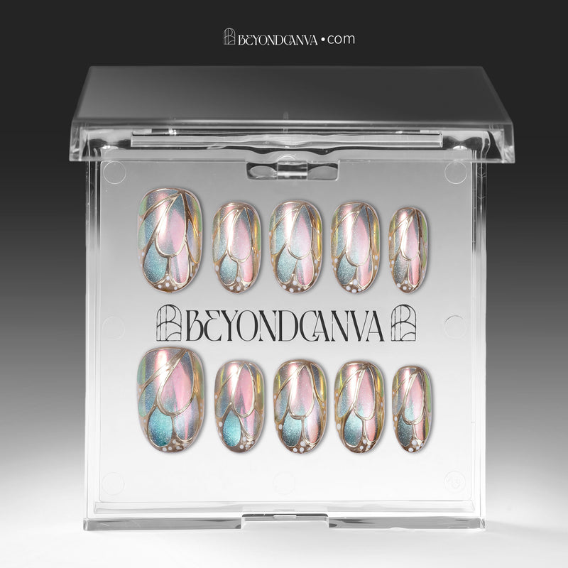 A set of iridescent pastel press-on nails displayed in a clear BeyondCanva box package