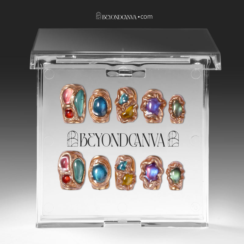 Boxed display of multicolor gemstone press-on nails arranged in a clear BeyondCanva case.