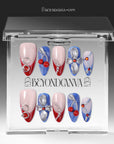Rebel Cherry handmade press-on nails displayed in a clear case with red, blue, and silver nail designs
