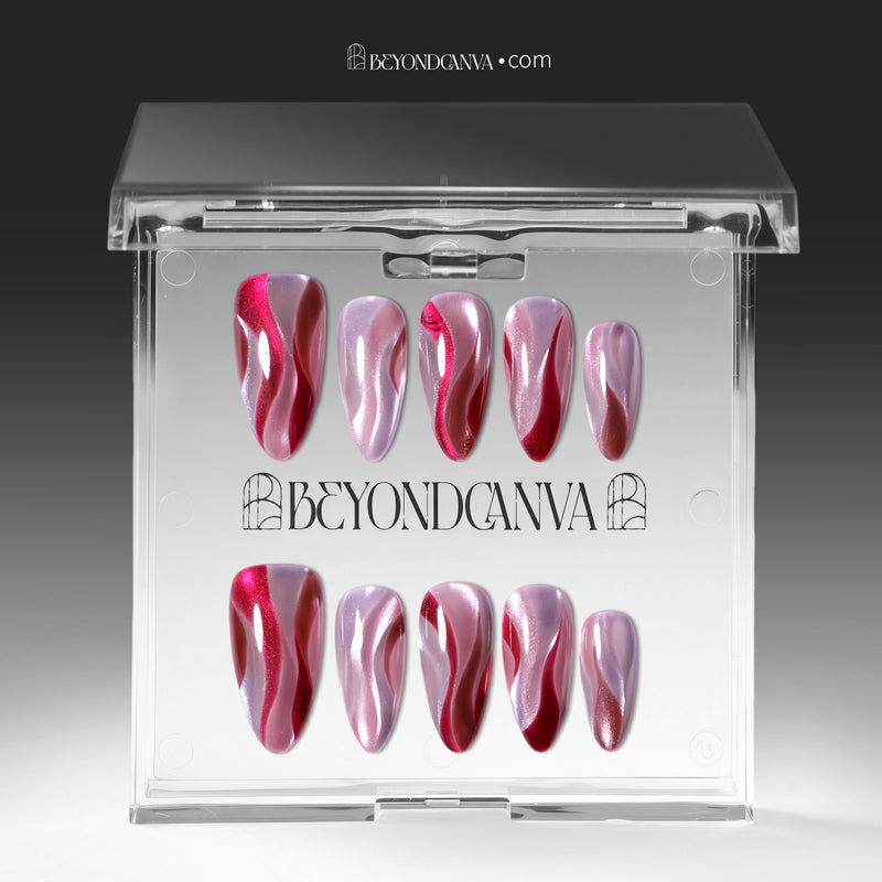 Rose Drift cat eye almond press-on nails displayed in a clear Beyondcanva packaging case with pink and burgundy wave designs