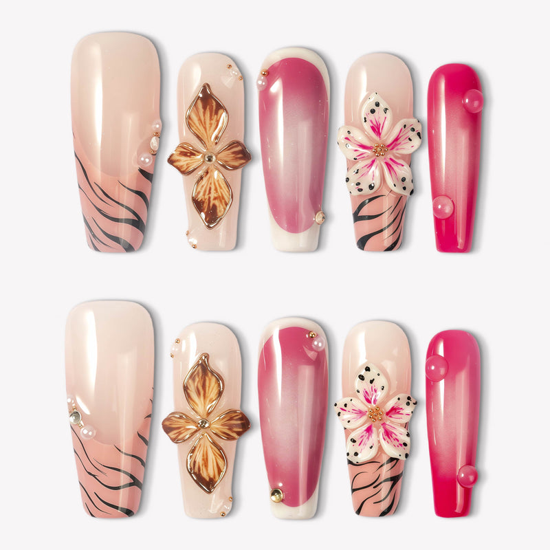 Sakura Blaze pink and nude press-on nails with raised gold flowers, sakura blooms and pearl accents