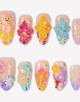 Tropical Bloom colorful press-on nail set with raised flowers, seashell details and crystal accents
