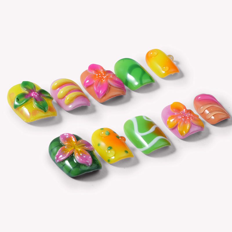 Individual Tropical Jelly Bloom press-on nails arranged on a white background with floral and wavy green, pink, yellow, and orange designs