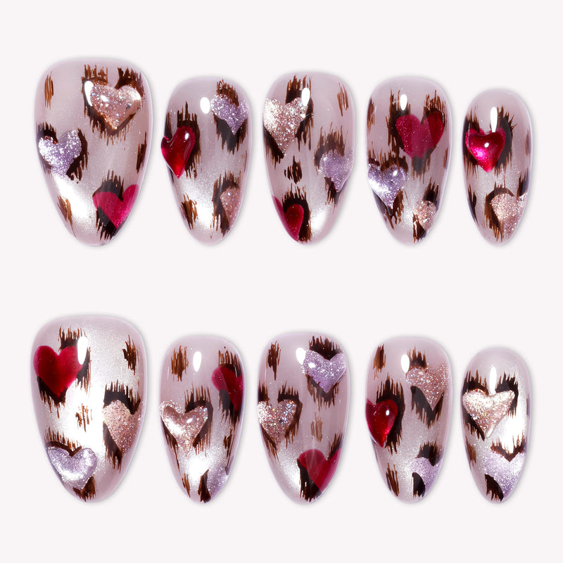Portrait of a hand model wearing red and white marble press-on nails